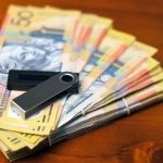 Australian dollars and nano wallet on the desk