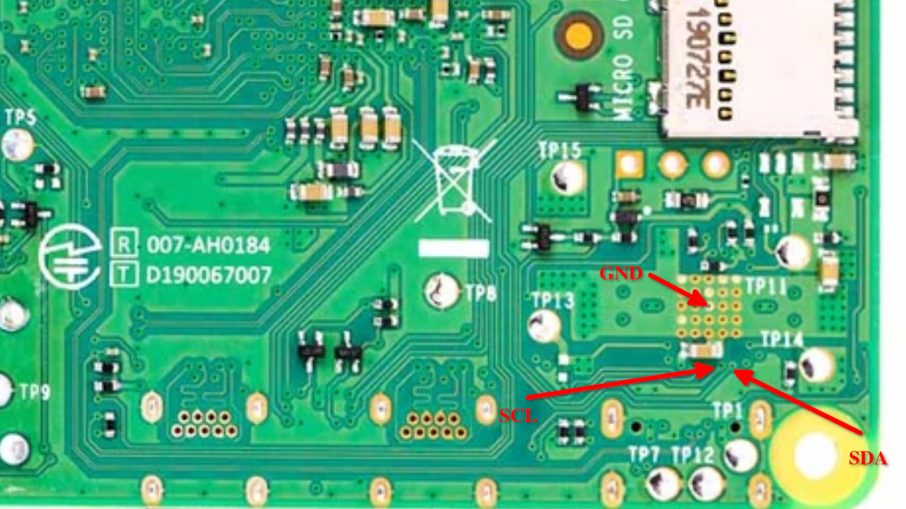 A picture of the bottom of the Pi 4 PCB, showing the three points you need to use to tap into the Pi 4 I2C bus going to the PMIC