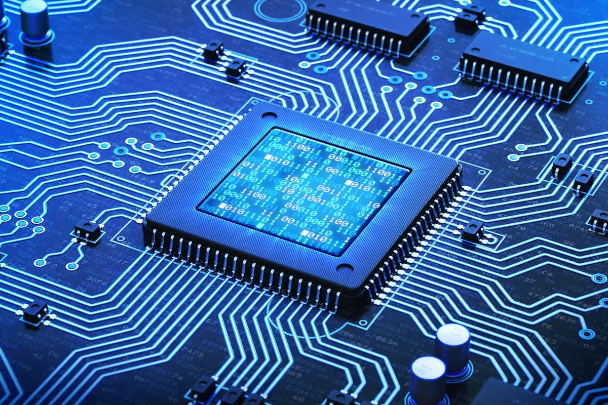 A circuit board with CPU / chip displaying glowing binary code.